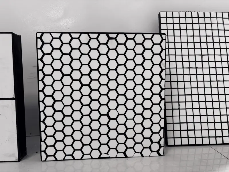 Rubber-ceramic panel with hexagonal alumina tiles
